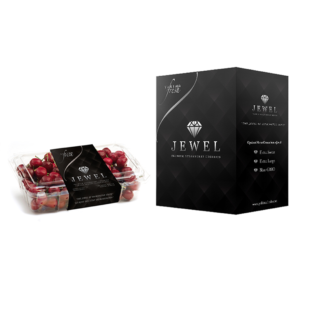 Jewel premium cherry packaging with a luxurious black design, showcasing large, sweet Washington cherries in a clear clam shell container and a matching black box.